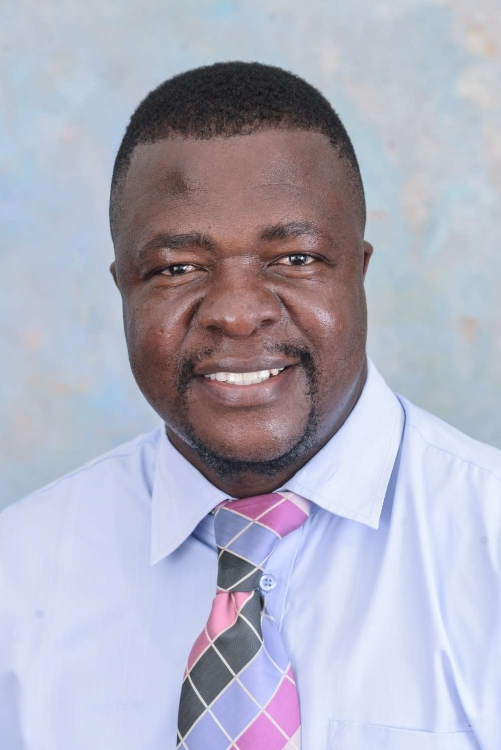 Dr. Caleb Mauwa